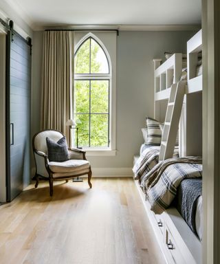 Bunk bed, white ladder, black sliding door