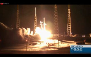 SpaceX's Falcon 9 rocket launches the unmanned Dragon capsule into orbit on May 22, 2012.