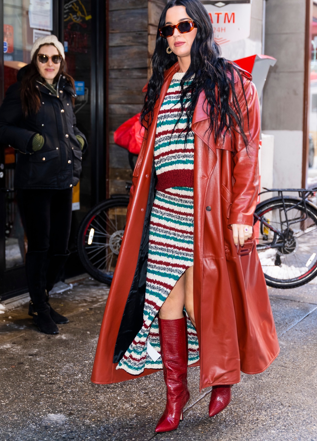 Katy Perry wearing red coat