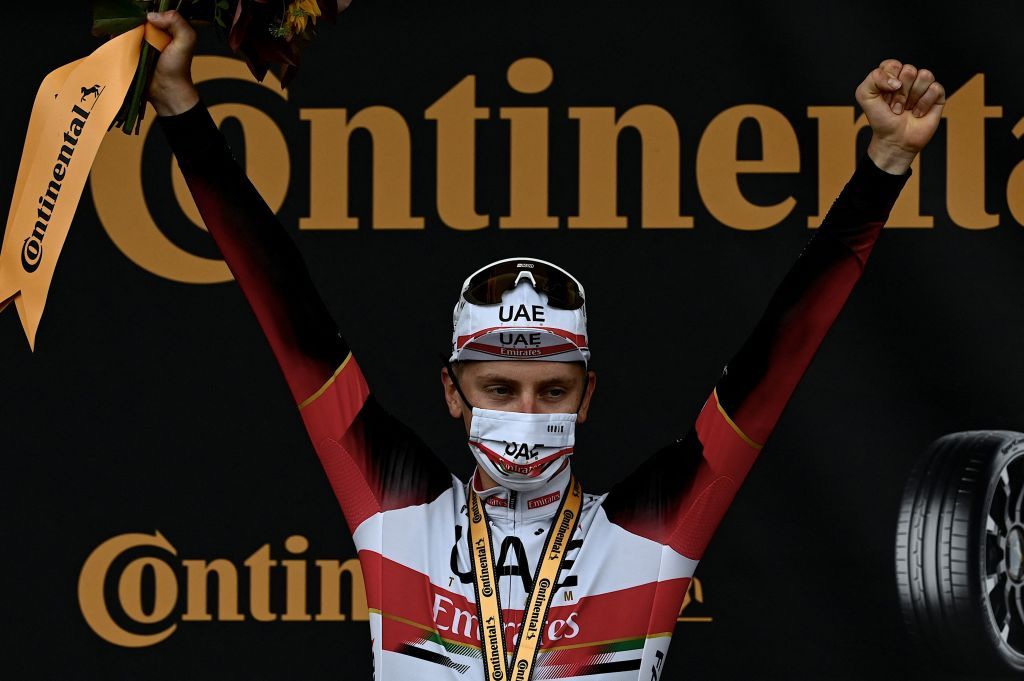 Stage winner Team UAE Emirates Tadej Pogacar of Slovenia celebrates on the podium after winning the 5th stage of the 108th edition of the Tour de France cycling race a 27 km time trial between Change and Laval on June 30 2021 Photo by Philippe LOPEZ AFP Photo by PHILIPPE LOPEZAFP via Getty Images