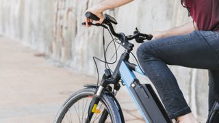 Woman riding unbranded e-bike