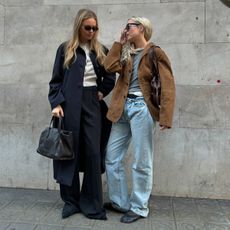 Stephanie Broek and Claire Rose in jackets and tro