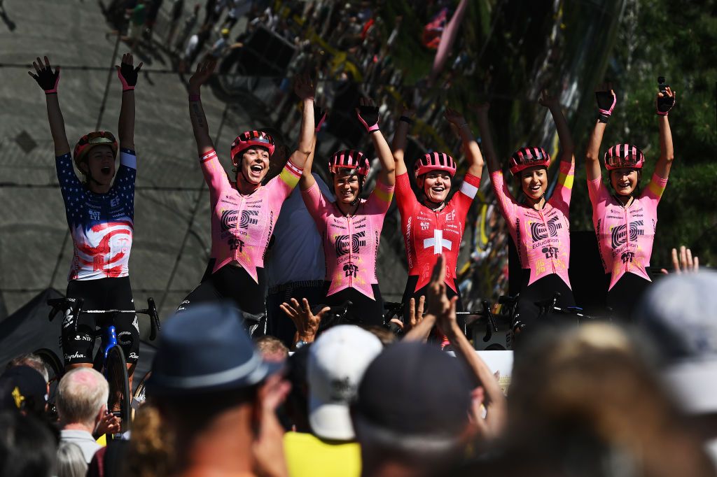 The EF-Oatly-Cannondale riders wave to the Tour de France Femmes
