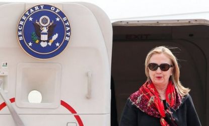 Secretary of State Hillary Clinton arrives at Don Muang International Airport on Nov. 18 in Bangkok, Thailand. President Obama has asked Clinton to leave a summit in Asia to mediate the escal