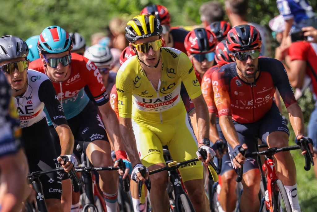UAE Team Emirates British rider Adam Yates wearing the overall leaders yellow jersey cycles with the pack of riders in Hendaye during the 3rd stage of the 110th edition of the Tour de France cycling race 1935 km between AmorebietaEtxano in Northern Spain and Bayonne in southwestern France on July 3 2023 Photo by Thomas SAMSON AFP Photo by THOMAS SAMSONAFP via Getty Images