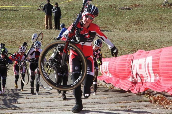 With a quick burst Emma White (Cyclocrossworldd) leads the pack up the steps.