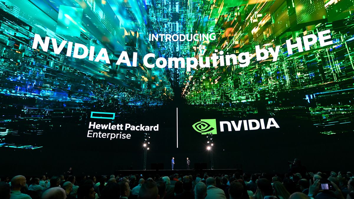 The words &#039;INTRODUCING NVIDIA AI Computing by HPE&#039; on a giant screen above the keynote stage of HPE Discover 2024. Beneath the words, the Hewlett Packard Enterprise and Nvidia logos sit side by side, above a stage on which stands Antonio Neri, CEO at HPE and Jensen Huang, CEO at Nvidia.