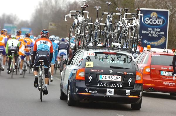 Andy Schleck (Saxo Bank) makes a trip back to the team car. Conserving effort in the first 250km is critical