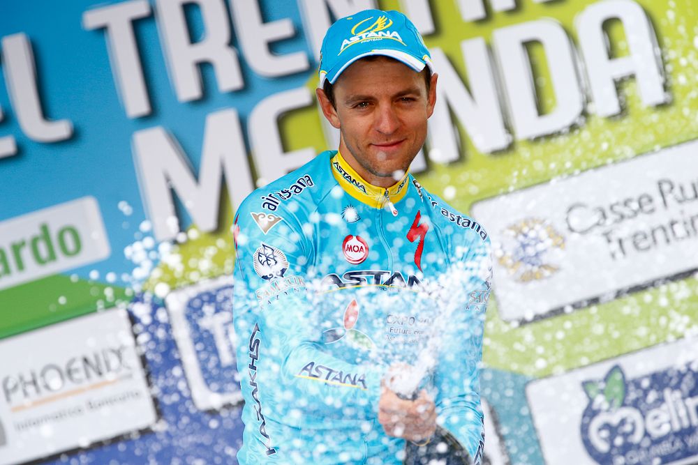 Tanel Kangert (Astana) celebrates on the stage 3 podium at the Giro del Trentino