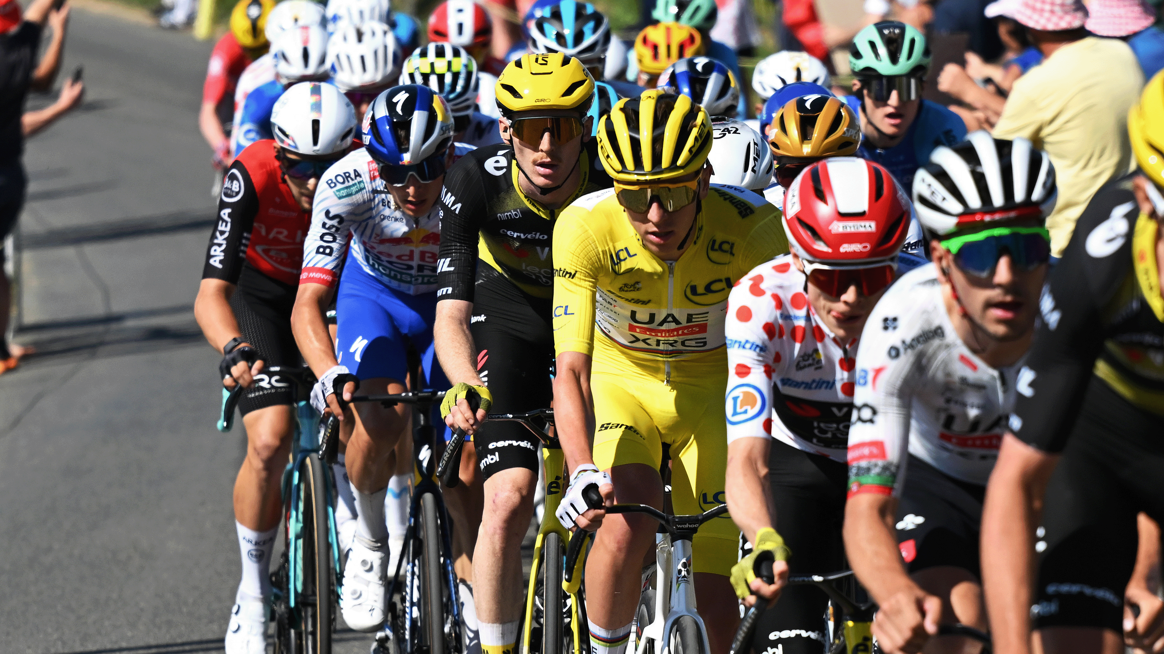 VIRE NORMANDIE, FRANCE - JULY 10: (L-R) Florian Lipowitz of Germany and Team Red Bull - BORA - hansgrohe, Matteo Jorgenson of The United States and Team Visma | Lease a Bike, Tadej Pogacar of Slovenia and UAE Team Emirates - XRG - Yellow leader jersey compete during the 112th Tour de France, Stage 6 a 201.5km stage from Bayeux to Vire Normandie / #UCIWT / on July 10, 2025 in Vire Normandie, France. (Photo by Tim de Waele/Getty Images)