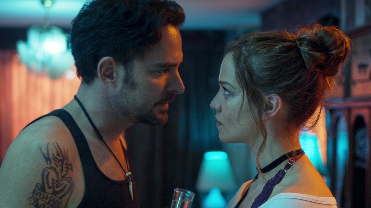 Carolina Miranda as Elisa and Manolo Cardona as Alexa Guzman in "Who Killed Sara" on Netflix.