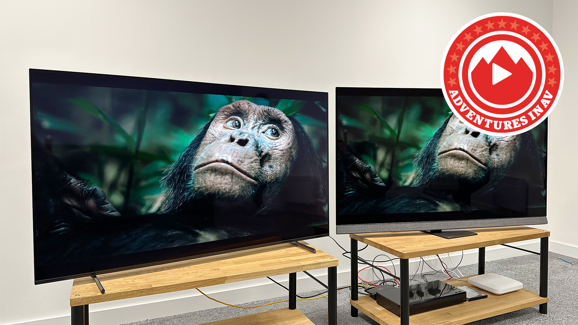 Sony A80L and Philips OLED907 side by side on wooden benches in a white room
