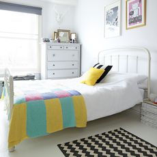 bedroom with bed and cushion