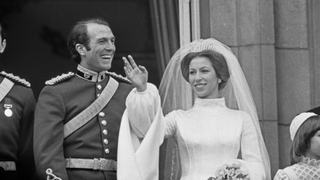 Princess Anne and Mark Phillips pose on the balcony of Buckingham Palace in London after their wedding, UK, 14th November 1973