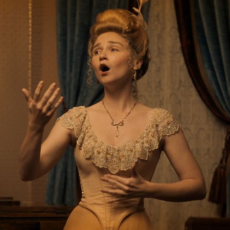 jessica barden as nance o'neil wearing 1800s era clothes and a wig performing operatic vocals on a stage in monster the lizzie borden story