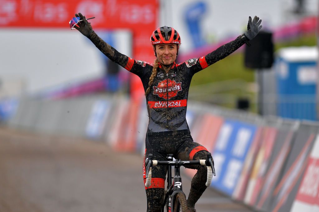 HULST NETHERLANDS JANUARY 03 Arrival Denise Betsema of The Netherland and Team Pauwels Sauzen Bingoal Celebration Mud during the 5th Vestingcross World Cup 2021 Womens Elite CX Vestingcross CXWorldCup Hulst on January 03 2021 in Hulst Netherlands Photo by Luc ClaessenGetty Images