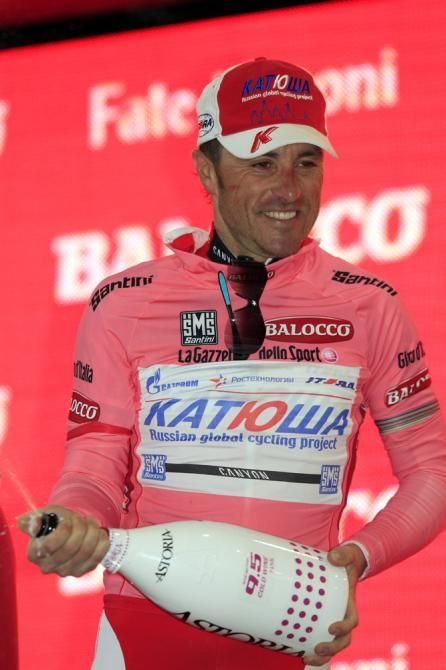 Luca Paolini (Katusha) celebrates another day in the maglia rosa.