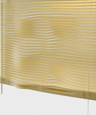 Gold coloured contoured window blind