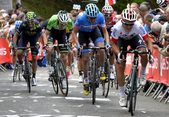 Polish champion Michal Kwiatkowski (Omega Pharma-Quickstep) leads the charge up the Mur de Huy ahead of Daniel Martin (Garmin)