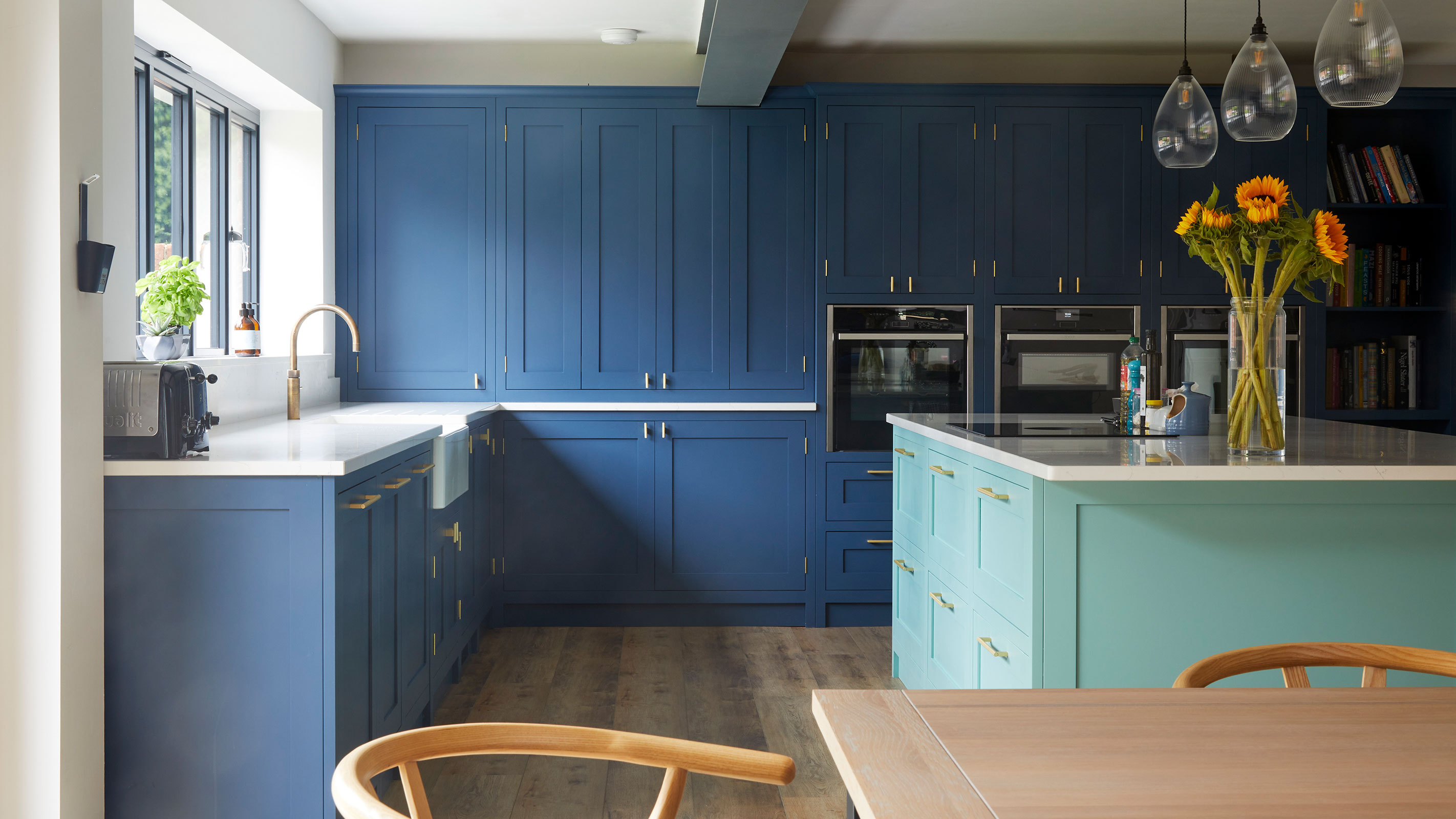 navy kitchen with aqua kitchen island