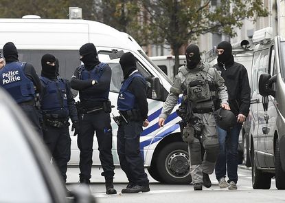 Belgian security forces conducted 7 raids around Brussels on Thursday