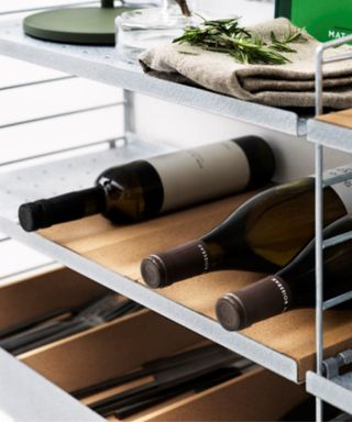 Cork shelf organizers used to lay wine bottles down and separate cutlery