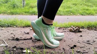Woman's feet wearing Hoka Mach X running shoes