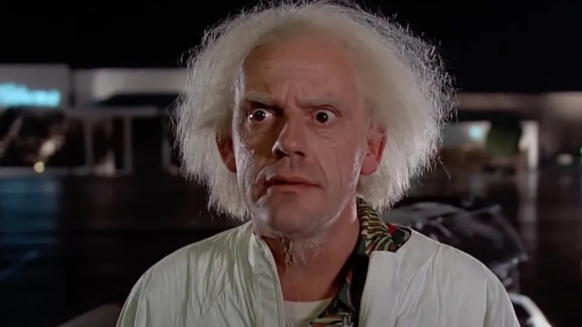 Christopher Lloyd as Doc in Back to the Future in the parking lot