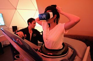 A guest experiences what it's like to walk on Mars with this antigravity treadmill at National Geographic's Mars dome in New York City