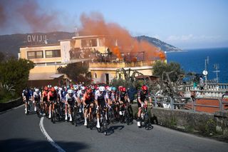 The pack rides through the Cipressa during the 115th MilanSanRemo oneday classic cycling race between Pavia and SanRemo on March 16 2024 Photo by Fabio FERRARI POOL AFP Photo by FABIO FERRARIPOOLAFP via Getty Images