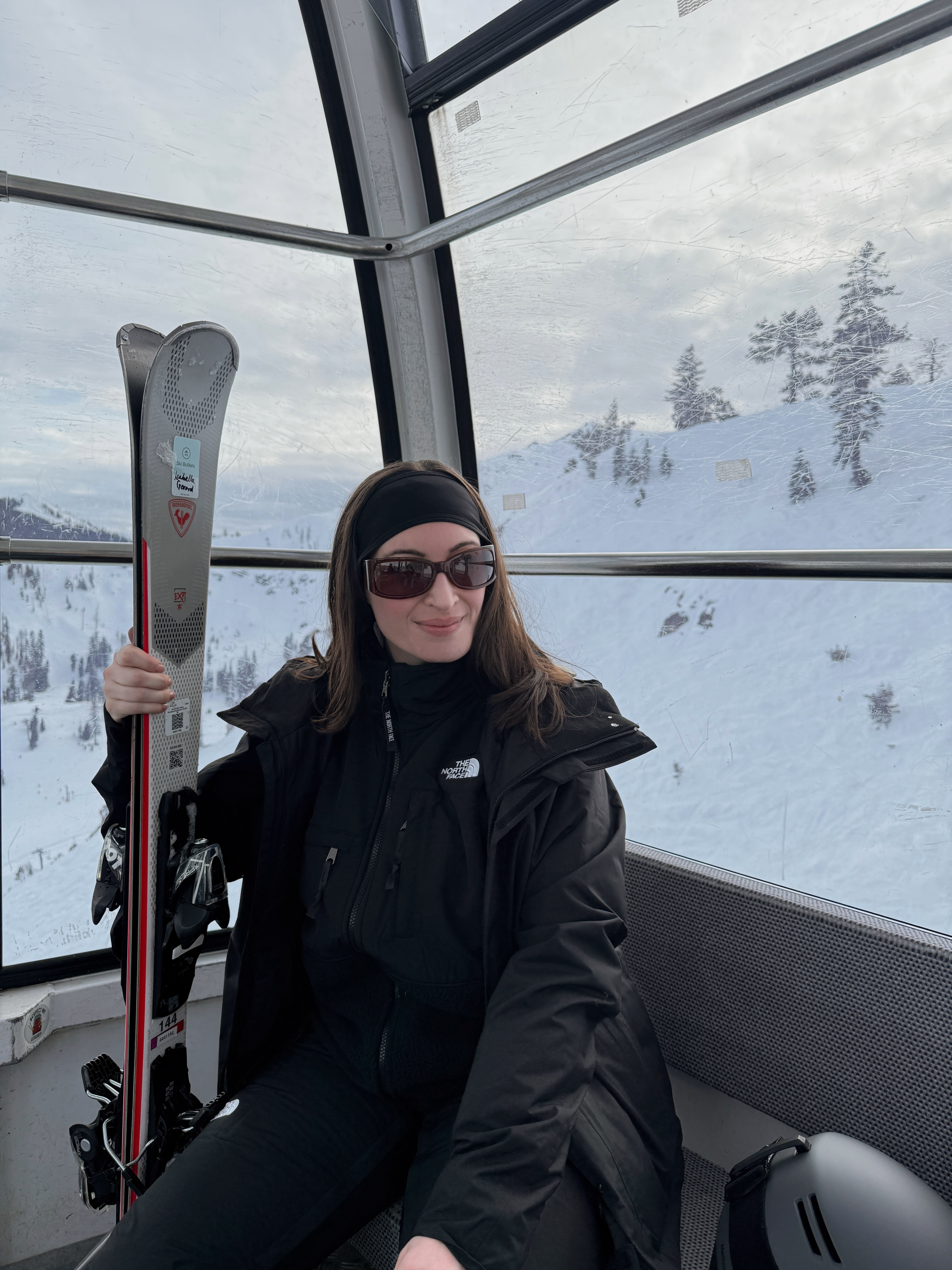 Bella Gerard wearing a ski suit with base layers