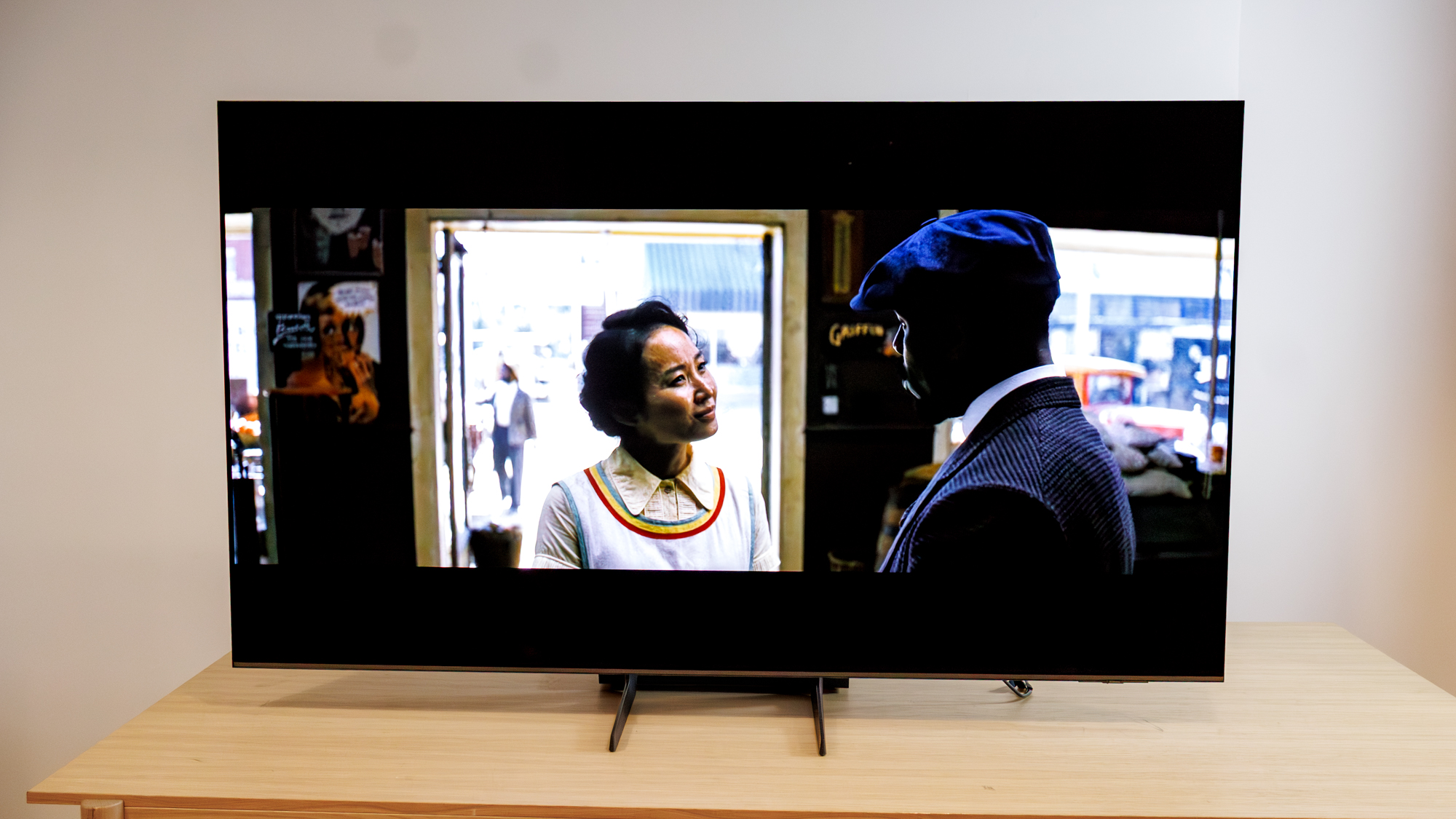 Samsung OLED S85F TV on a table