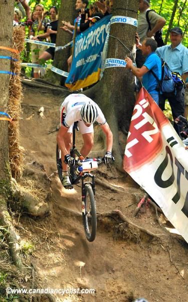 Alexander Gehbauer (Austrian National Team) floats over the roots