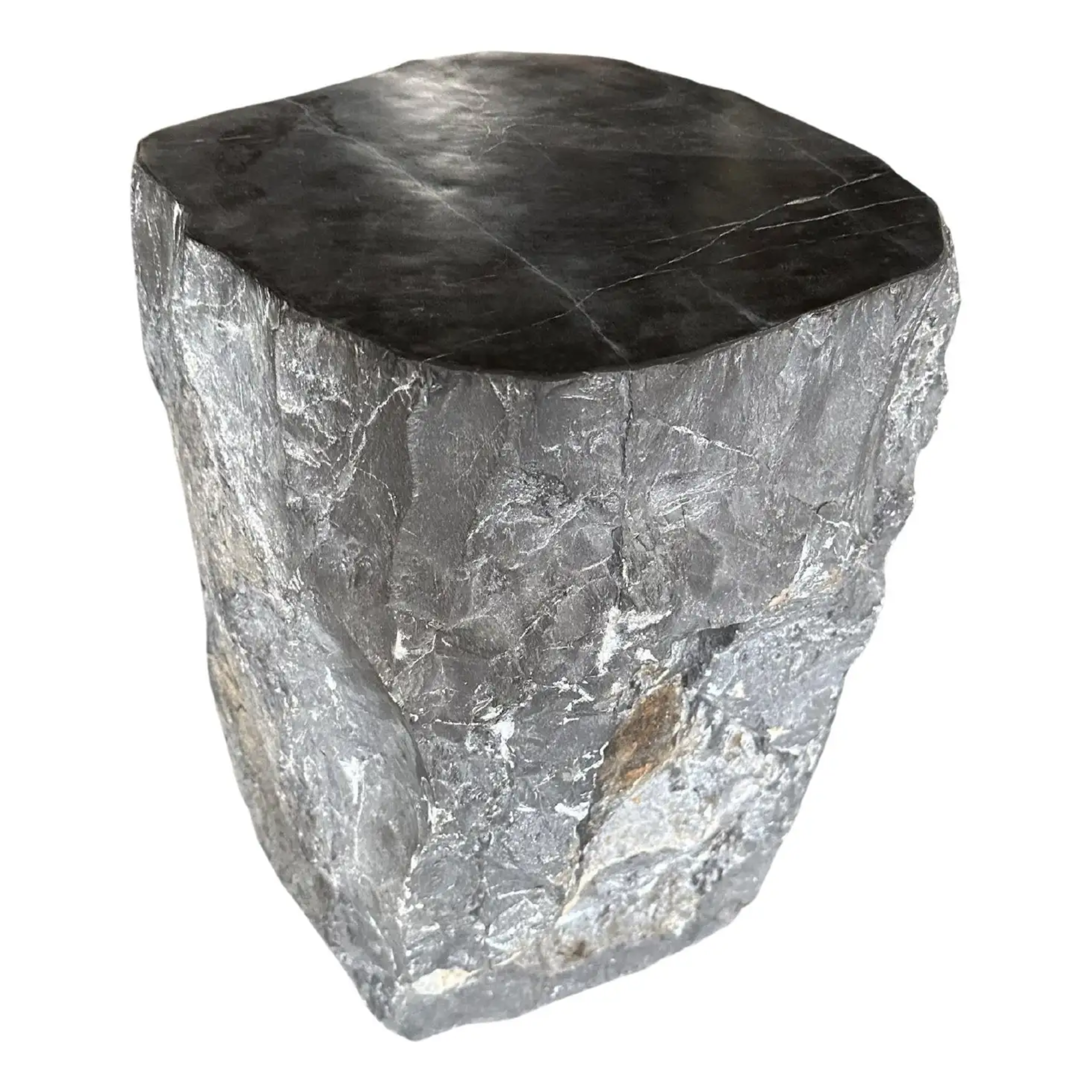 a monolithic marble side table in dark gray