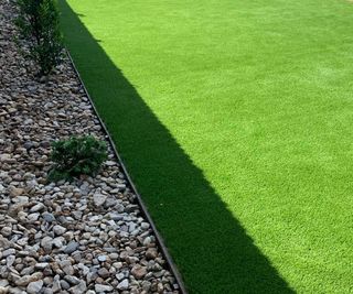 section of lawn with metal edging and gravel