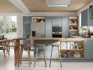 Blues and green kitchens are on-trend, fitted with islands, pantries and even desk space