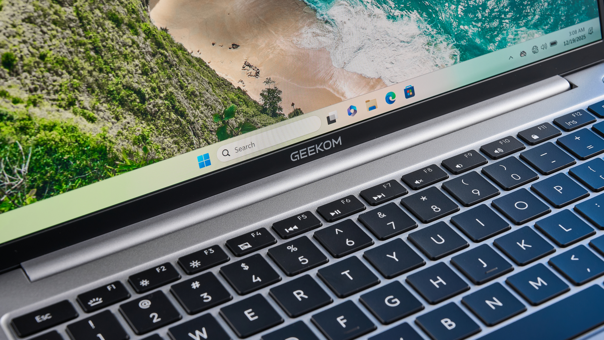 A silver Geekom GeekBook X14 Pro Windows laptop