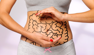 Woman distressed by gut health digestion