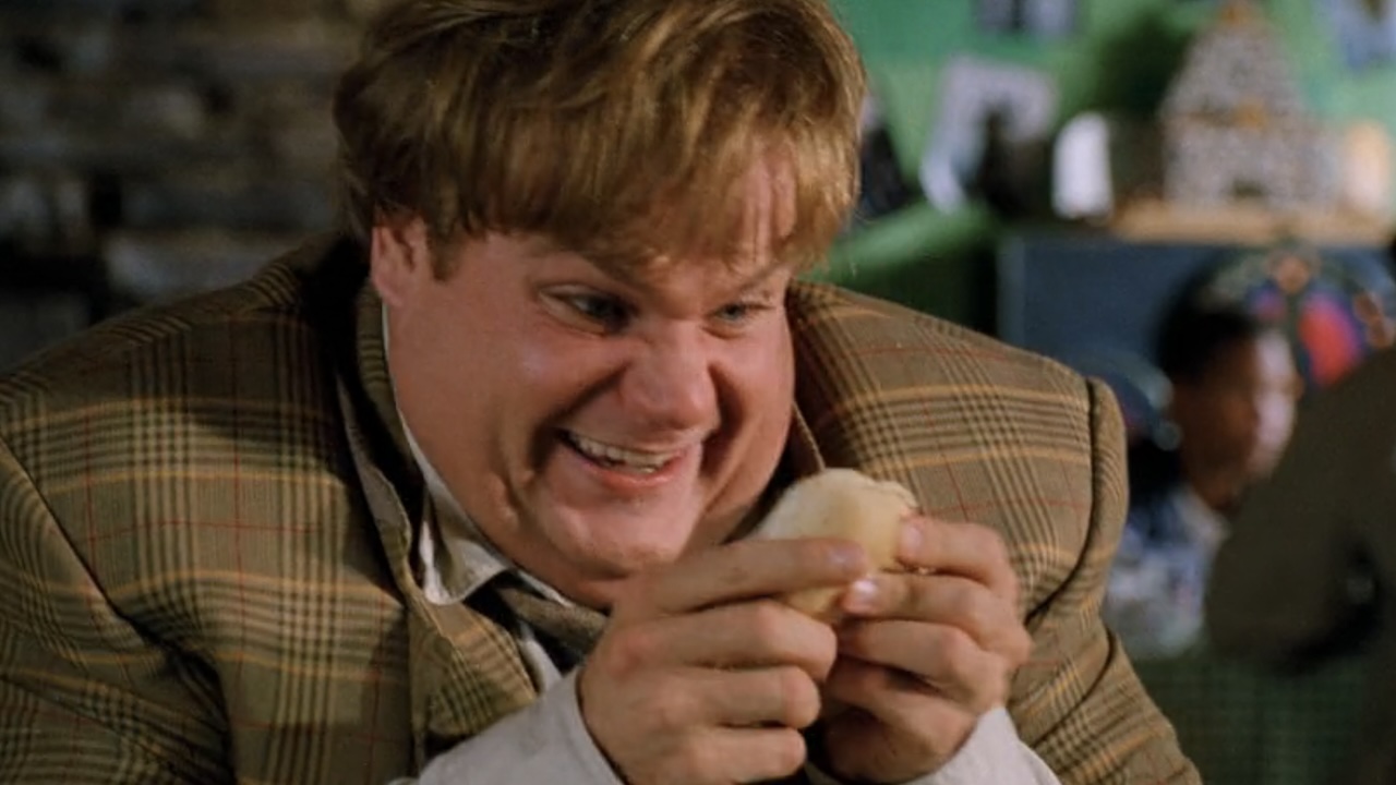 Tommy smiling at a roll in Tommy Boy.