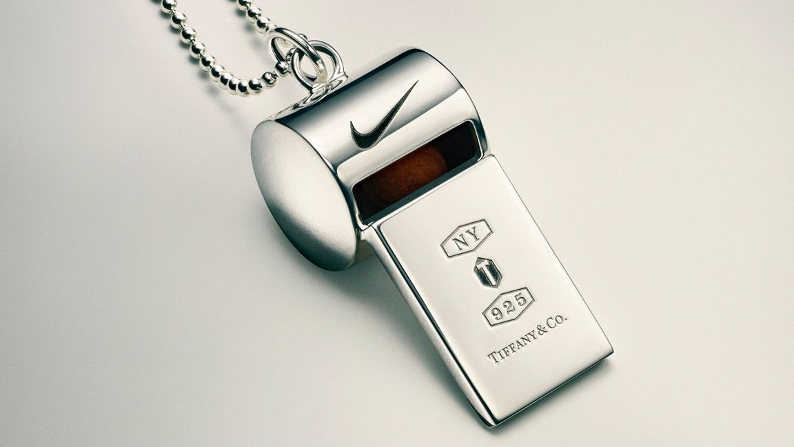 Tiffany x Nike; a silver whistle branded with the Nike Swoosh
