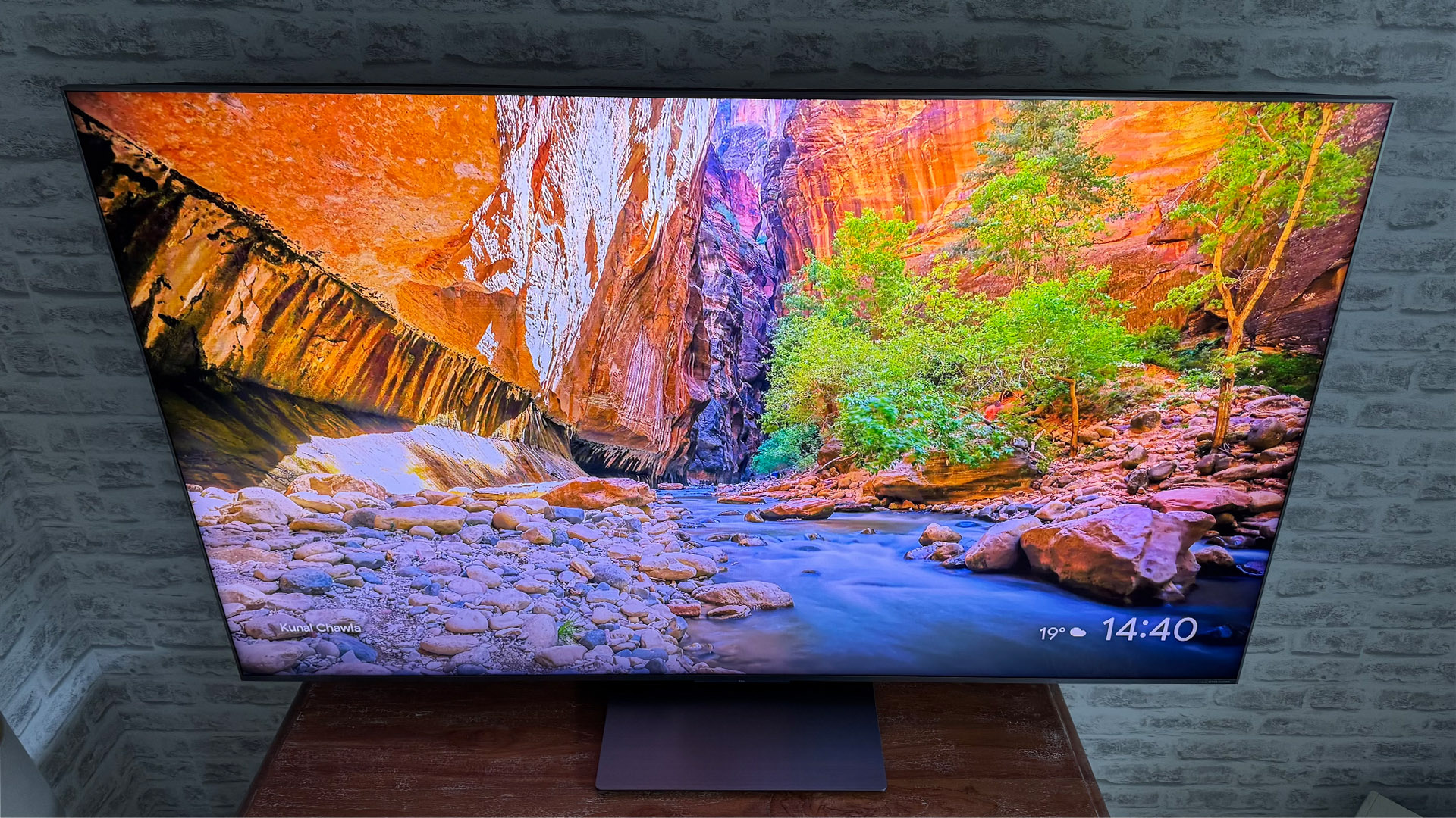 The 65-inch TCL C7K Mini LED TV photographed in a living room