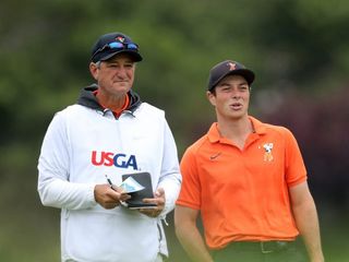 Hovland and his caddie