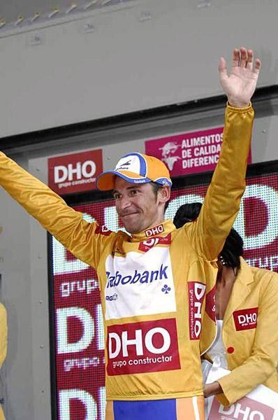 Denis Menchov has nine more stages before he can keep this golden jersey