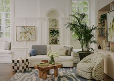 A living room with a mix of different patterns