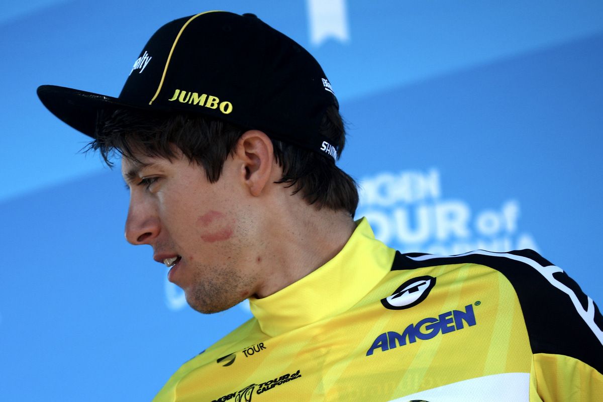 New race leader George Bennett in yellow on the podium