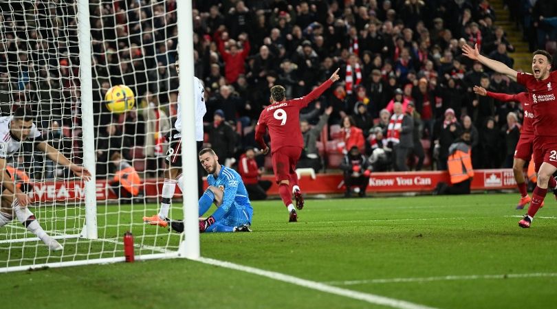 Roberto Firmino wheels away in celebration after scoring against Manchester United