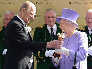 The time Prince Philip handed Queenie her racing trophy