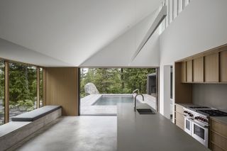Camera House by Leckie Studio minimalist interior looking out