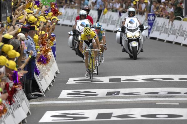 Andy Schleck desperately tries to hold onto his yellow jersey.