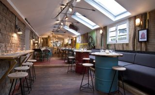 The reclaimed furniture is now being used as tables at Notting Hill restaurants